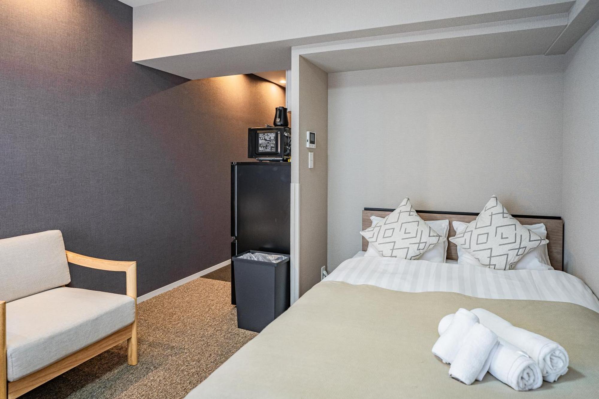 Apartment Hotel 11 Umeda Kamiyama Осака Екстер'єр фото