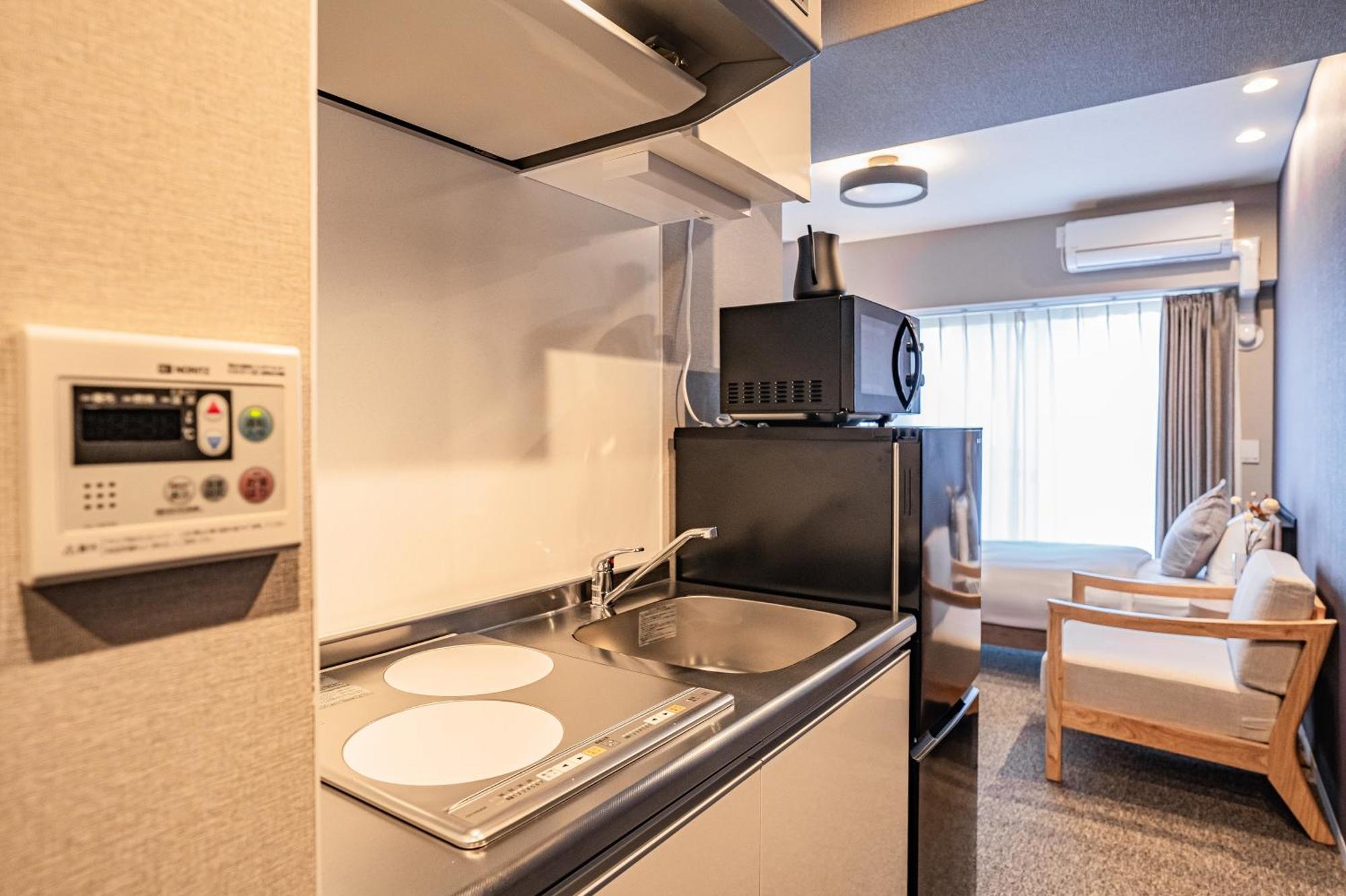 Apartment Hotel 11 Umeda Kamiyama Осака Екстер'єр фото
