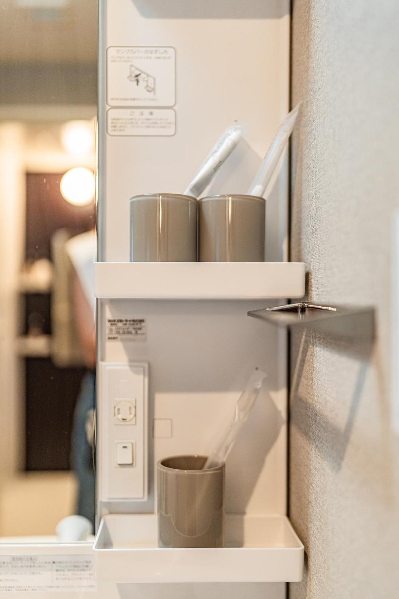 Apartment Hotel 11 Umeda Kamiyama Осака Номер фото