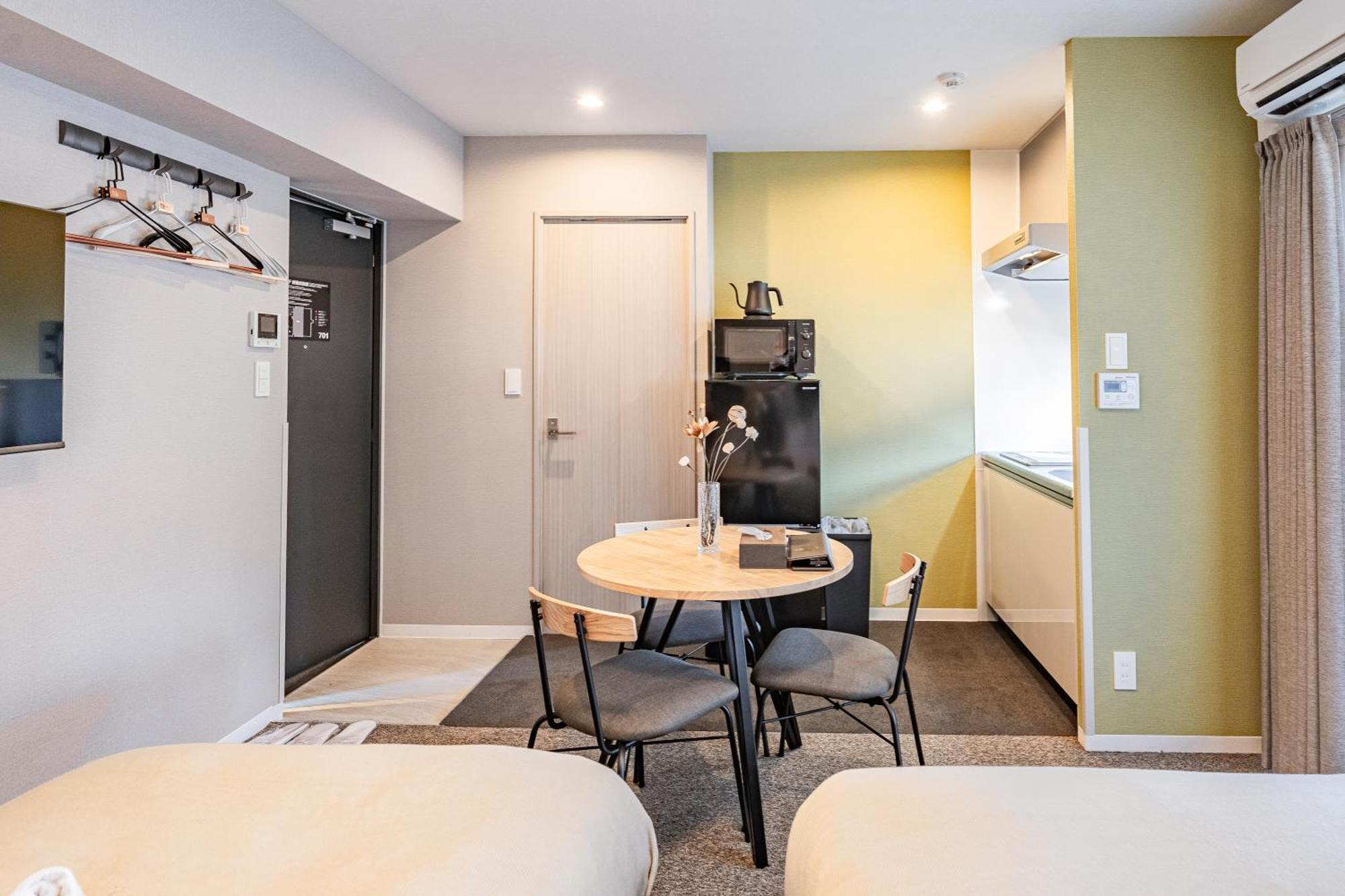 Apartment Hotel 11 Umeda Kamiyama Осака Номер фото
